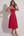Vestido midi con corsé y falda fluida