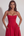 Vestido midi con corsé y falda fluida