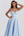 Vestido midi con corsé y falda amplia