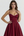 Vestido midi con corsé y falda amplia