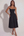 Vestido midi con corsé y falda fluida