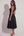 Vestido midi con corsé y falda fluida