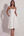 Vestido midi con corsé y falda fluida