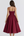 Vestido midi con corsé y falda amplia