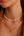 Collar con colgante de corazón de alivio