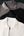 Elegante jersey con cremallera y estampado a rayas