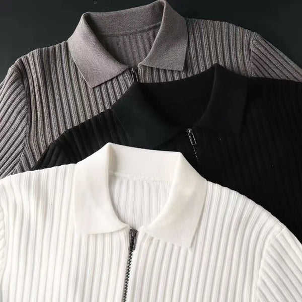 Elegante jersey con cremallera y estampado a rayas