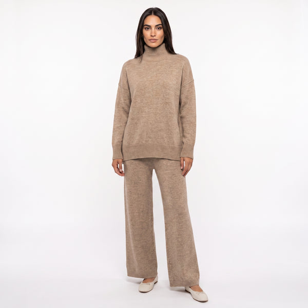 Conjunto de suéter de punto de cuello alto y pantalones vaqueros