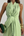 Valentina | Mono Halter con lazo frontal y corte wide-leg palazzo